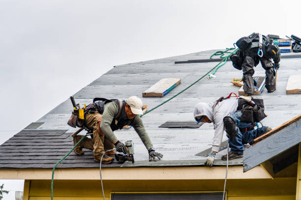 Professional Roofing technician working in Sun City, CA